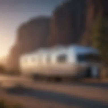 Exterior view of a quality used travel trailer parked in a scenic location