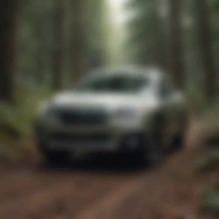 Subaru Outback navigating through wooded trails