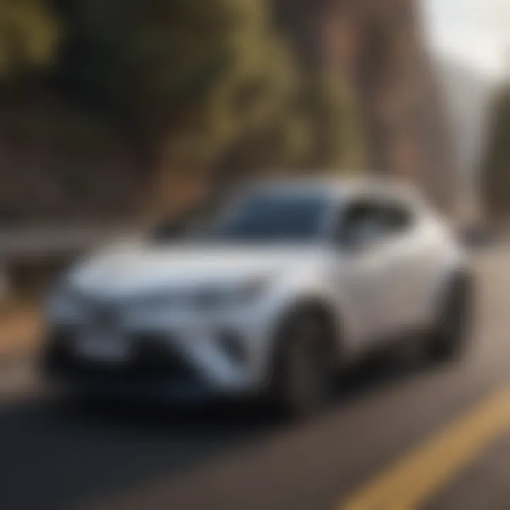 Dynamic driving experience with the Toyota C-HR on a scenic road.